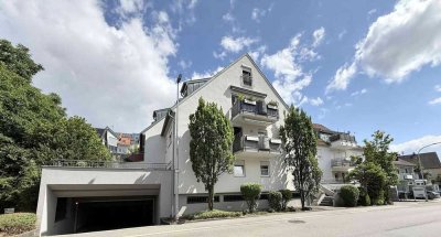 Charmantes, loftartiges Apartment mit Tiefgarage –  vermietetes Investment in zentraler Lage