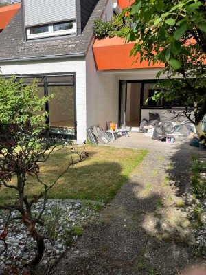 Erstbezug nach Sanierung: Terrassen-Whng mit Parkett, Kamin, Garten und Garage