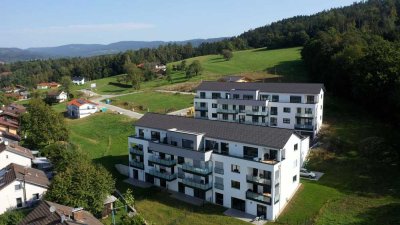 Natur trifft Stadt.  Sonnige 107 m² Gartenwohnung in Hunderdorf