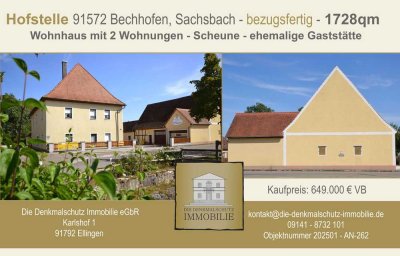 Hofstelle mit bezugsfertigen Wohnungen und Scheune