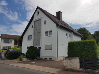 Mehrfamilienhaus mit 4 Wohnungen und großen Balkonen mit Waldblick in Bad Vilbel