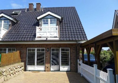 End-Hausteil mit SÜD-Terrasse, Carport und Gartenhaus in strandnaher, ruhiger Lage