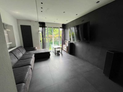 Geschmackvolle 3-Zimmer-Wohnung mit gehobener Innenausstattung mit Einbauküche Terrasse und Garten