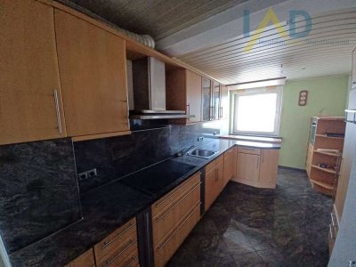 Vielseitiges Zweifamilienhaus mit Anbau, Kaminzimmer und Dachterrasse