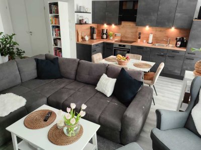 Moderne EG-Wohnung (2 Zi., ca. 60 m²) mit Terrasse und Gartenanteil