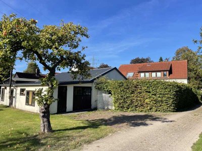 Teilvermietetes Zweifamilienhaus inkl. Baugrundstück in Schwanewede-Beckedorf zu verkaufen