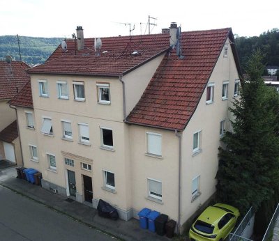 Attraktive Doppelhaushälfte mit drei teilungserklärten Mietwohnungen – Perfekt für Kapitalanleger!