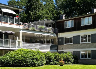 Große Erdgeschoss-Wohnung mit sonniger Süd-Terrasse und einem Garagenstellplatz