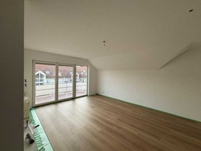 Stilvolle 2-Zimmer-Dachgeschosswohnung mit Einbauküche in Mühlheim am Main