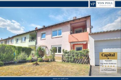 Charmantes Zweifamilienhaus mit 8 Zimmern, Garten & Garage – Platz für zwei Generationen