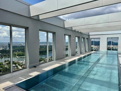 Design trifft Ausblick - 2 Zimmer Wohnung mit Pool am DACH - U1 vor der Türe