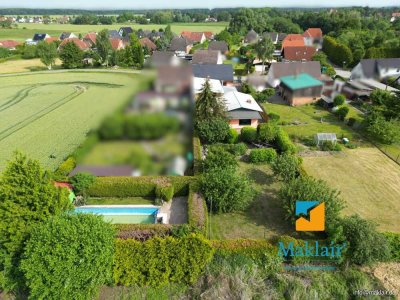 „Ihr neues Zuhause: Doppelhaushälfte mit idyllischem Garten, Hof und Nebengebäuden.“