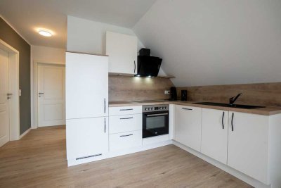 Moderne Dachgeschoss Wohnung in Moordorf