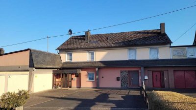 Eigentumswohnung mit 3 ZKB, Garten und Garage