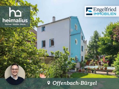 Besonderes Wohnhaus mit Ruhe-Oase, attraktiver Außenanlage und Doppelgarage