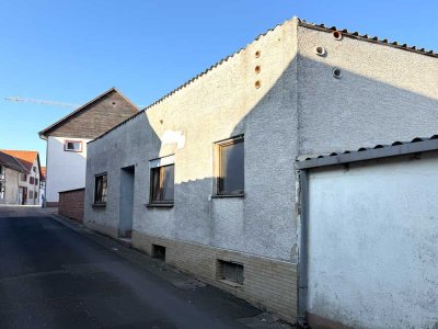 Projekt für Visionäre – Bungalow in erstklassiger Lage mit Sanierungsbedarf