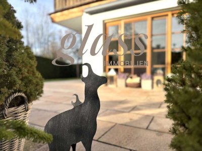 Alpenstil & Wärme – Gartenwohnung mit Kachelofen und sonnigem Garten