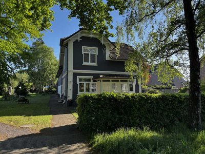 2-Zimmer-EG-Wohnung im Altbau mit Terrasse und EBK in Norderstedt