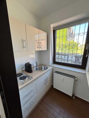 Helle 1-Zimmer-Wohnung mit neuer Einbauküche & Stellplatz – Ruhige Lage