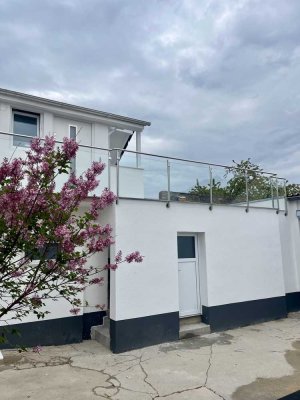 Helles 1,5-Zimmer-Apartment mit traumhafter Dachterrasse und Weitblick