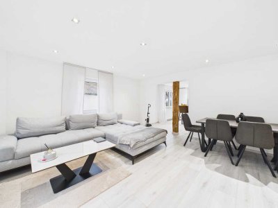 Ein Ort zum Ankommen - Modernisierte 2,5-Zimmer-Wohnung mit Terrasse & Stellplatz