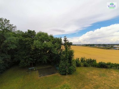 Große 4-Zimmer-Eigentumswohnung mit Balkon und traumhaften Blick in Feldrandlage!