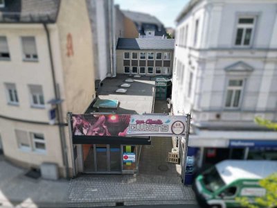 Immobilienpaket - 2 Wohnungen + 2 Gewerbeeinheiten