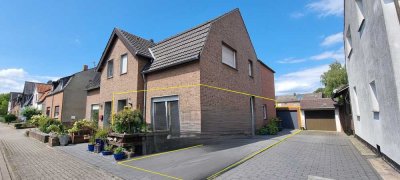 Erdgeschosswohnung (2-Zi) mit Garten und Garage