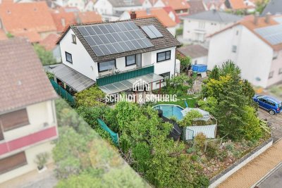 Ihr Traumhaus erwartet Sie: Charmantes Zweifamilienhaus mit Pool