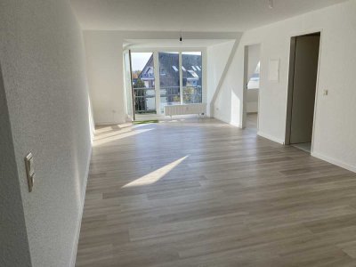 2 Zimmer Dachgeschosswohnung mit Tiefgaragenstellplatz