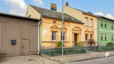 Charmantes Reihenendhaus mit großzügigem Grundstück