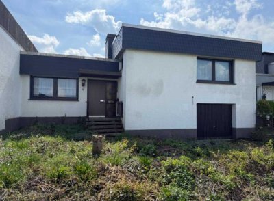 Reihenmittelhaus mit Wintergarten, Garage und Weitblick – Ruhige Lage