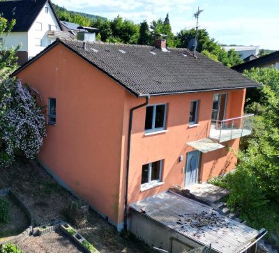 Grüne Oase: Einfamilienhaus in ruhiger Waldrandlage mit wunderschönem Fernblick