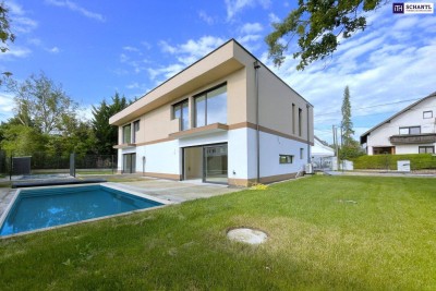 Wohnen wie im Urlaub: Moderne Doppelhaushälfte mit Pool, Terrasse & Garten in familienfreundlicher Lage in Brunn am Gebirge – nur wenige Minuten von Wien entfernt!