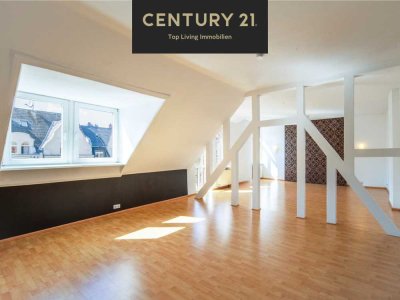 Exklusiv über den Wolken – Dachwohnung im charmanten Dichterviertel