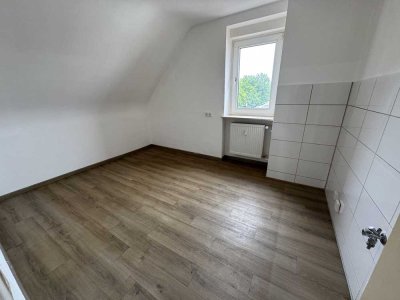 3-Zimmer-Wohnung mit Dachboden, ruhige Lage & Top-Anbindung