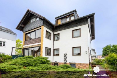 BERK Immobilien – Vielseitiges Mehrfamilienhaus mit Einliegerwohnung und Nebengebäude