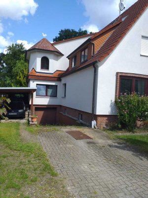 Eigentumswohnung im OG und DG in zentraler, ruhiger Lage mit Grundstück