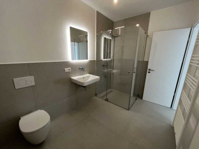 Stilvoll Wohnen in Ginsheim-Gustavsburg: Neubau mit Balkon, Aufzug & Tiefgarage