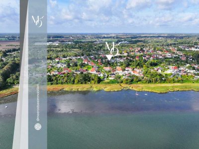 Entwicklungschance in gefragter Lage // DHH mit Garten und Potenzial in Andershof // Nähe Strelasund