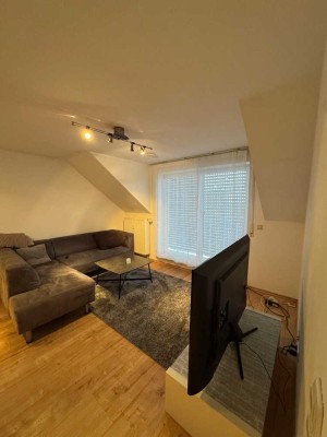 Geschmackvolle 2-Raum-DG-Wohnung mit Balkon im Zentrum von Warthausen