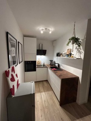 Wunderschöne 2-Zimmer-Wohnung mit Balkon und TG-Platz