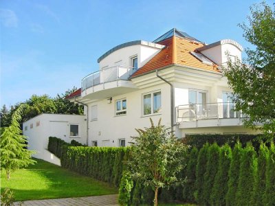 Wohnen, Arbeiten, Vermieten – vielseitiges Einfamilienhaus mit Einliegerwohnung in Bestlage