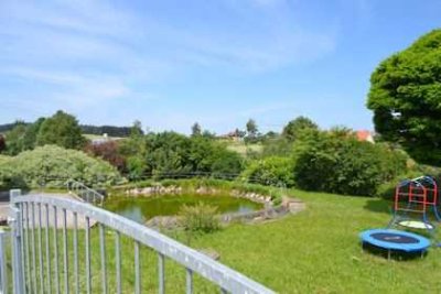 164 m² Wohnkomfort: 4 Zimmer mit Balkon, Garage & Garten