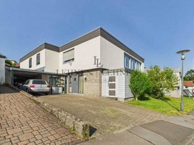 Charmantes Einfamilienhaus mit Panoramablick, weiterem Bauplatz, Garten und Einliegerwohnung