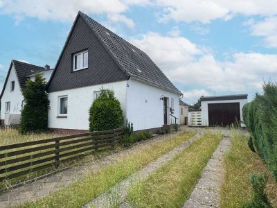 Stark sanierungsbedürftiges Einfamilienhaus auf attraktivem Grundstück