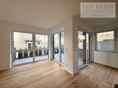 Erstbezug in Toplage – hochwertige Erdgeschosswohnung am Stadtwald, im Grünen über Siegens Dächern