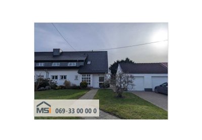 Sonnige Zweifamilien-Doppelhaushälfte mit großem Grundstück in Feldrandlage