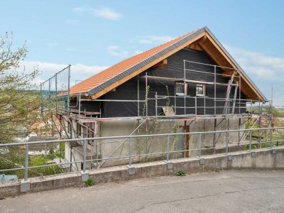 Attraktiver Rohbau in Hanglage – Selbstbauprojekt in Frei-Laubersheim mit Traumaussicht