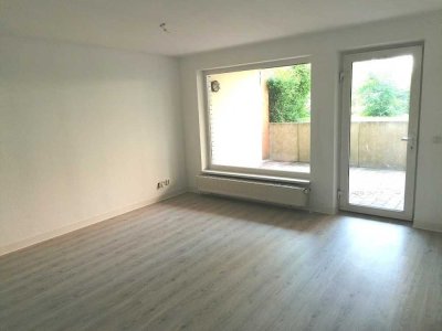 großzügige 3-Zimmer Souterrainwohnung mit Küche und Terrasse!